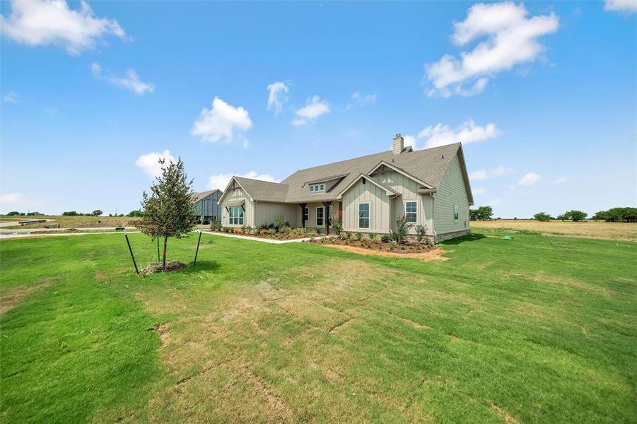 Front exterior of a new home in Rocky Top, Krum, TX, highlighting curb appeal (Image 27).