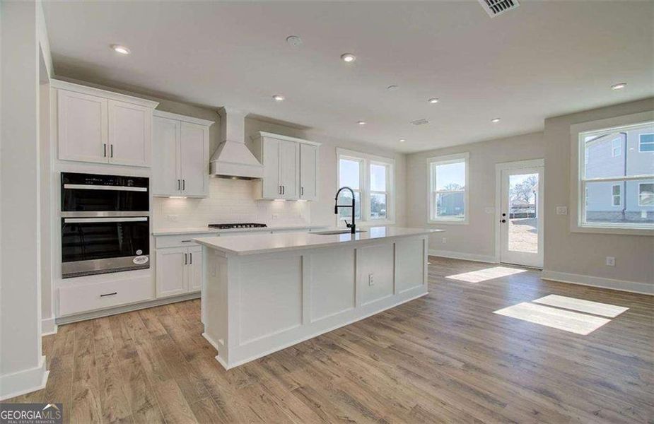 Furnished interior view inside a new home in The Paddocks at Doc Hughes, Buford (Image 12).