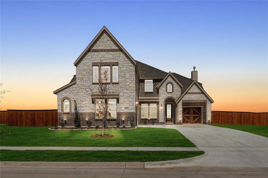 Front exterior of a new home in Glenbrook, Red Oak, TX, highlighting curb appeal (Image 2).