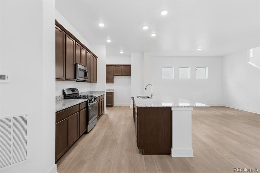 Furnished interior view inside a new home in Painted Prairie Cottage, Aurora (Image 15).