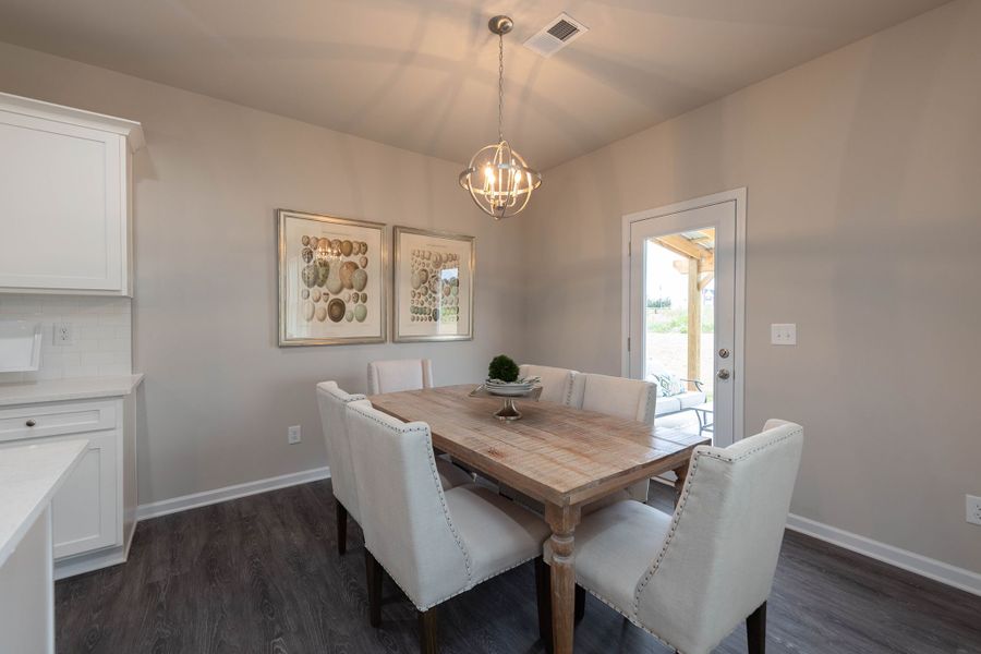 The large kitchen opens to the breakfast area