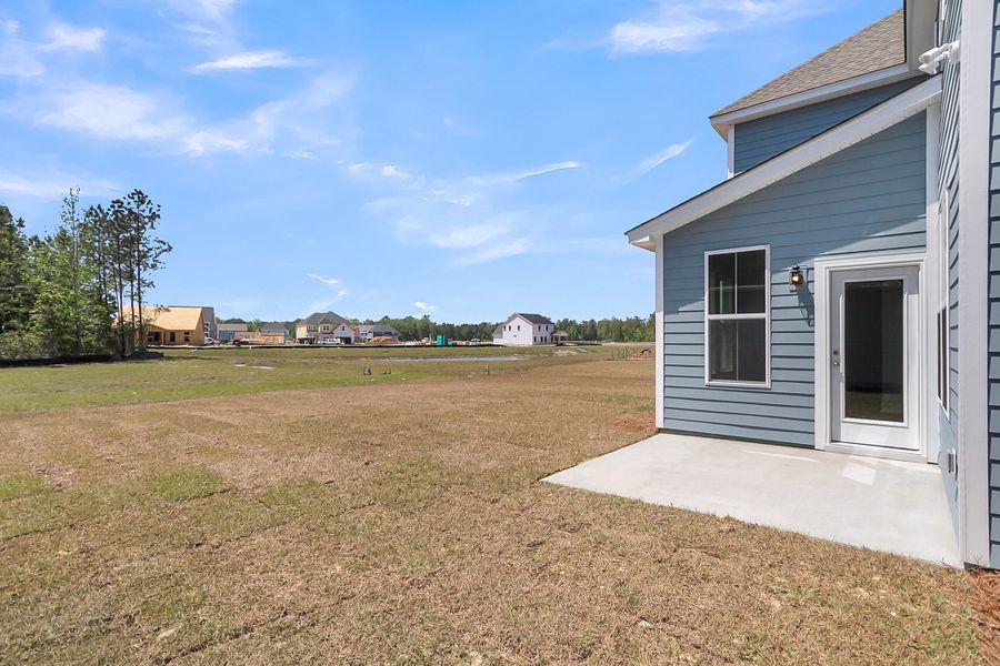 Front exterior of a new home in , Summerville, SC, highlighting curb appeal (Image 23).