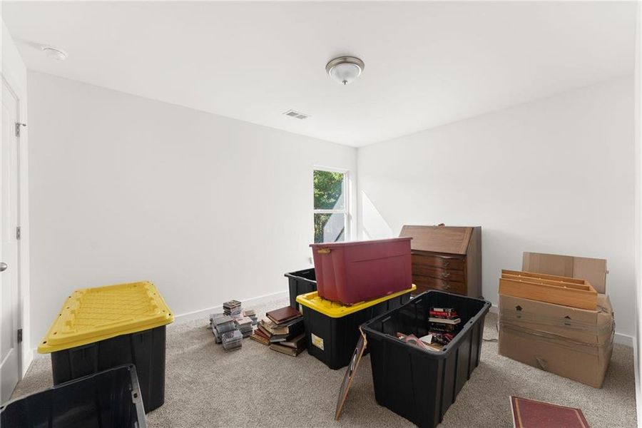 Furnished interior view inside a new home in Ellington Farms, Statham (Image 32).