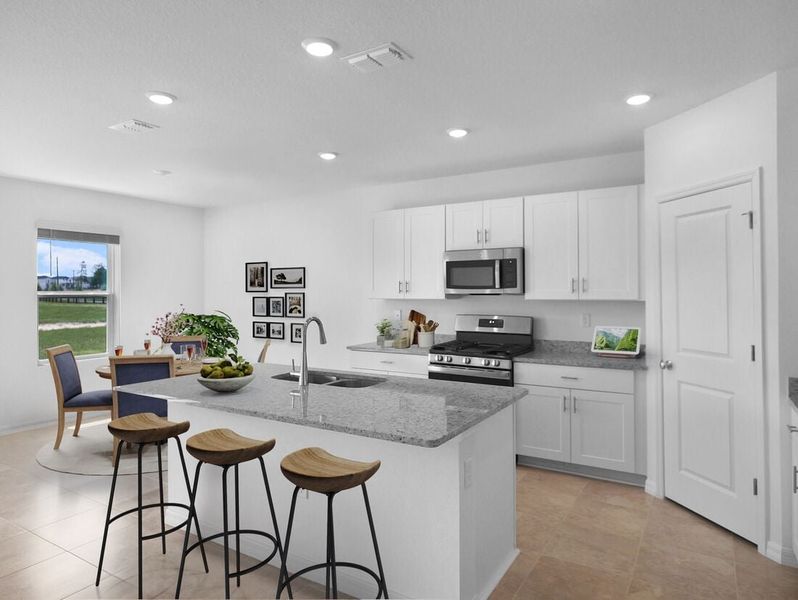 Representative furnished interior of a home built from the Azalea by Taylor Morrison in Palm Wind, Hudson (Image 5).