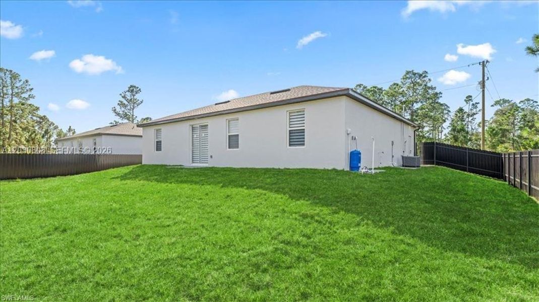 Exterior details and patio area of a home in , Lehigh Acres (Image 3).