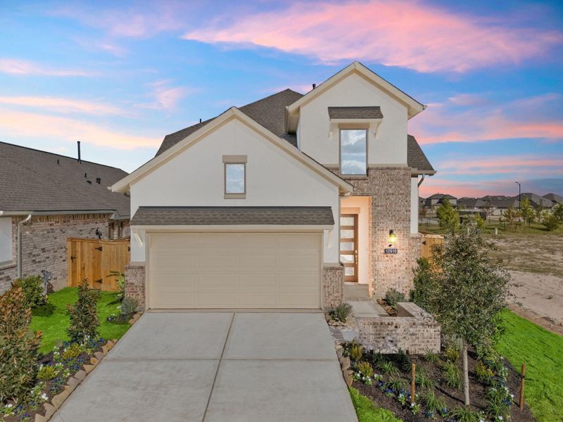 Front exterior of a new home in Bridgeland, Cypress, TX, highlighting curb appeal (Image 23).