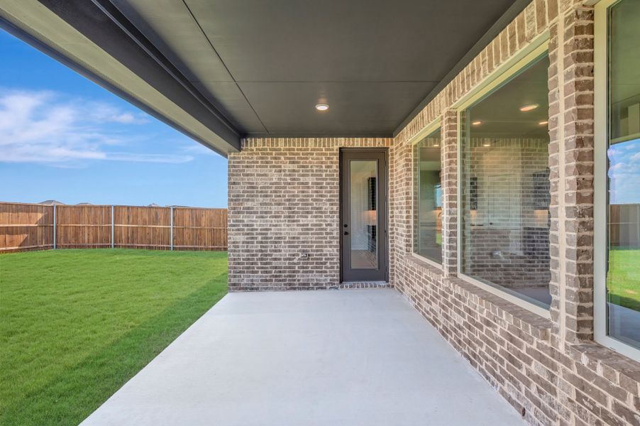 Exterior details and patio area of a home in LaPrelle, Fort Worth (Image 19).
