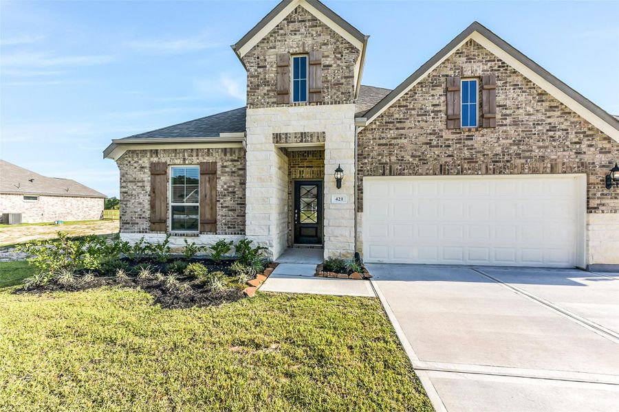 Front exterior of a new home in , Cleveland, TX, highlighting curb appeal (Image 19). Front exterior of a new home in , Cleveland, TX, highlighting curb appeal (Image 19).