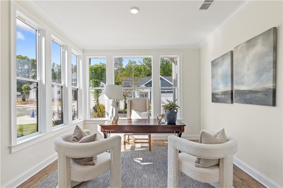 Furnished interior in a model home at The Courtyards by The Manor in Alpharetta (Image 24).