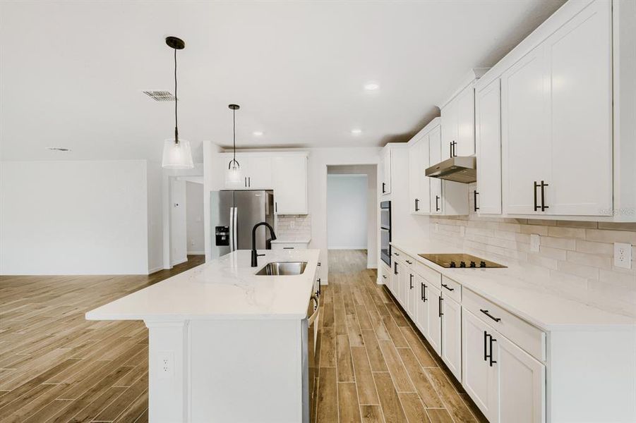 Furnished interior view inside a new home in The Grove at Stuart Crossing - Signature Series, Bartow (Image 9). Furnished interior view inside a new home in The Grove at Stuart Crossing - Signature Series, Bartow (Image 9).