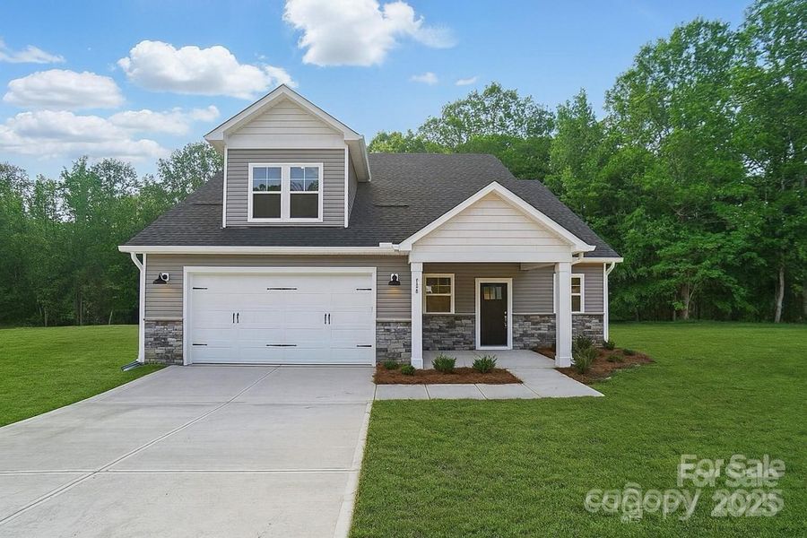 Front exterior of a new home in , Statesville, NC, highlighting curb appeal (Image 1). Front exterior of a new home in , Statesville, NC, highlighting curb appeal (Image 1).