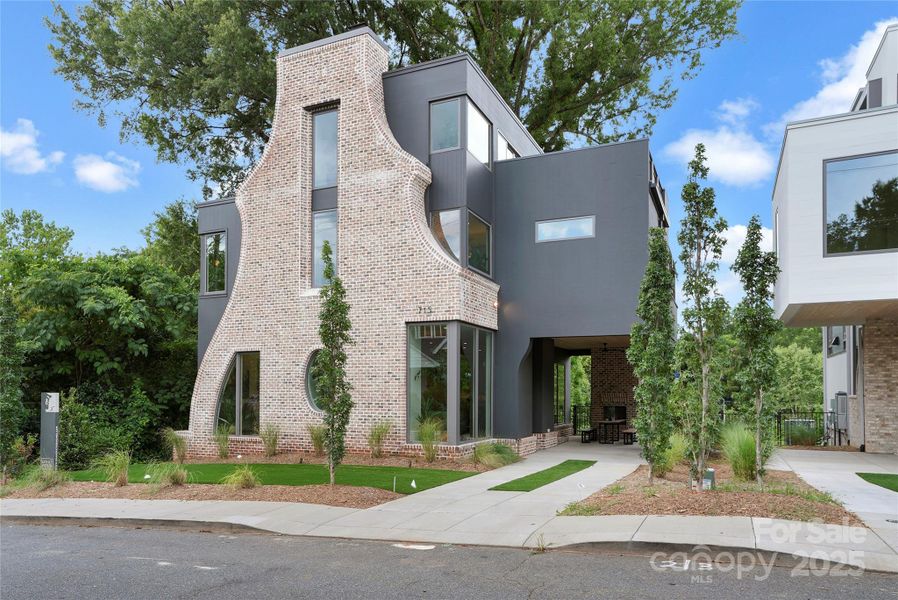 Front exterior of a new home in , Charlotte, NC, highlighting curb appeal (Image 21).