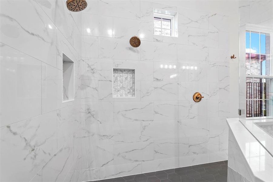 Bathroom with tiled shower