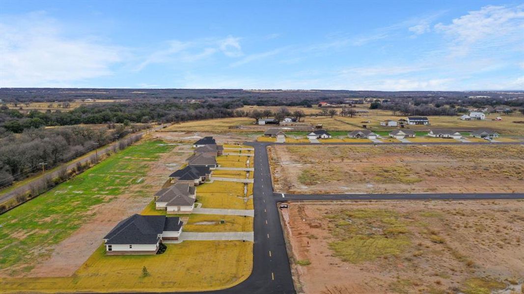 Aerial view featuring a rural view Aerial view featuring a rural view