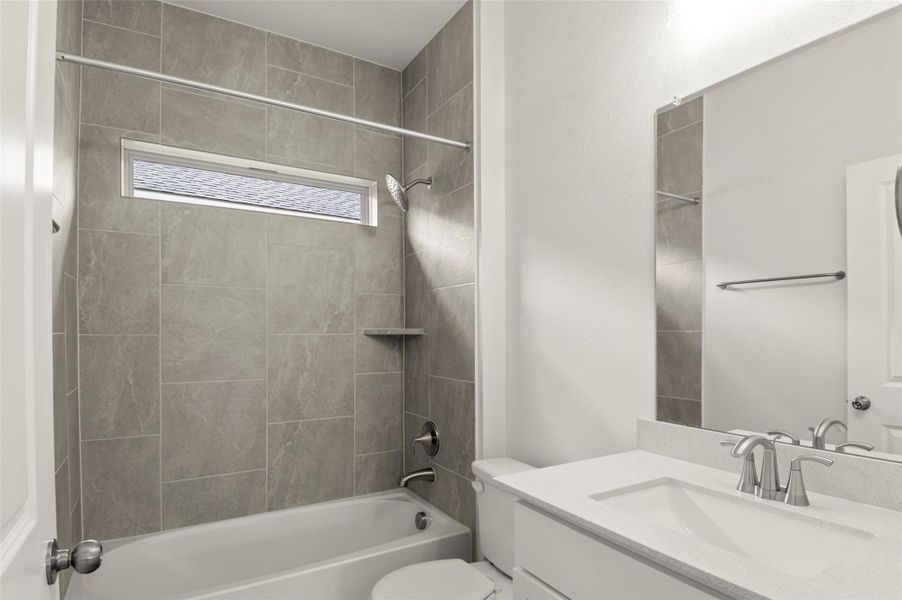 Furnished interior view inside a new home in Crosswinds, Kyle (Image 9).