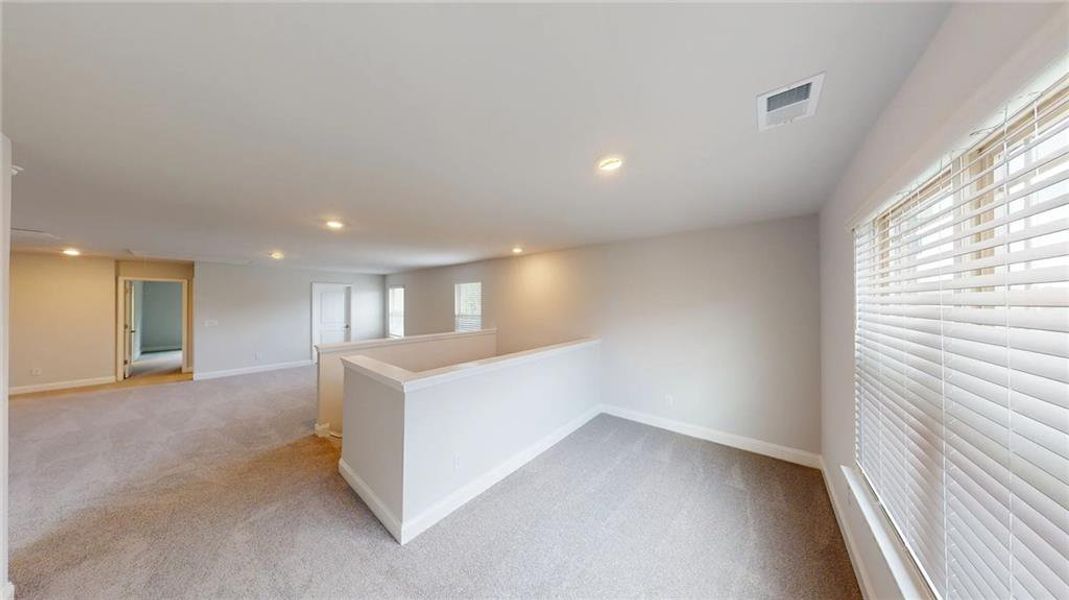 Spacious, unfurnished interior of a new home in Mirror Lake at South Harbour, Villa Rica (Image 21).