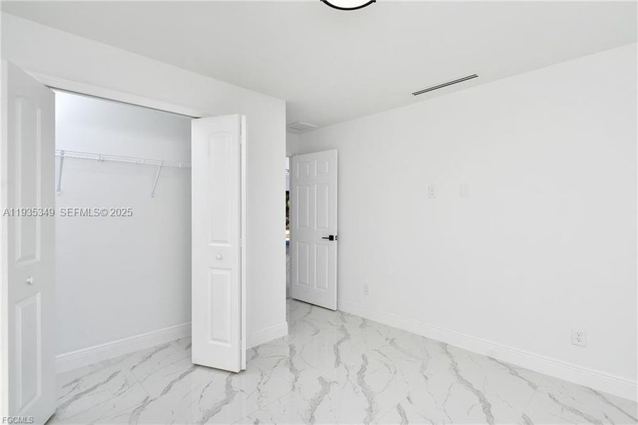 Spacious, unfurnished interior of a new home in , Lehigh Acres (Image 15).