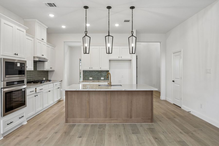 Furnished interior view inside a new home in Country Lakes, Denton (Image 9).