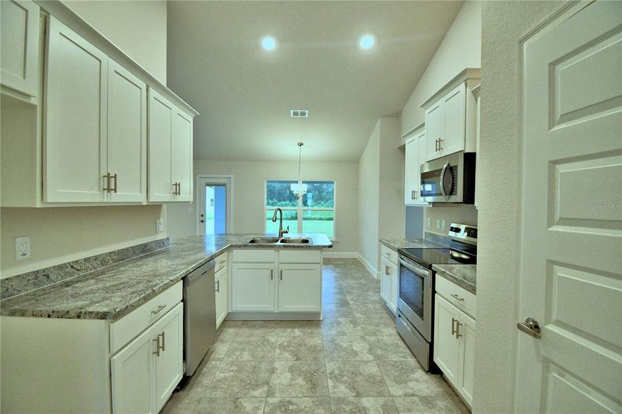 Furnished interior view inside a new home in Cadence Crossing, Auburndale (Image 13). Furnished interior view inside a new home in Cadence Crossing, Auburndale (Image 13).
