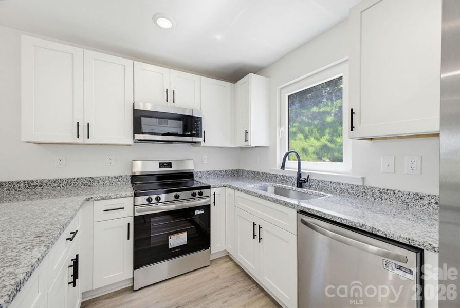 Furnished interior view inside a new home in , Conover (Image 7).
