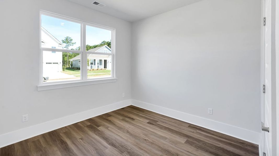Spacious, unfurnished interior of a new home in The Haven at Indigo Preserve, Leland (Image 20).