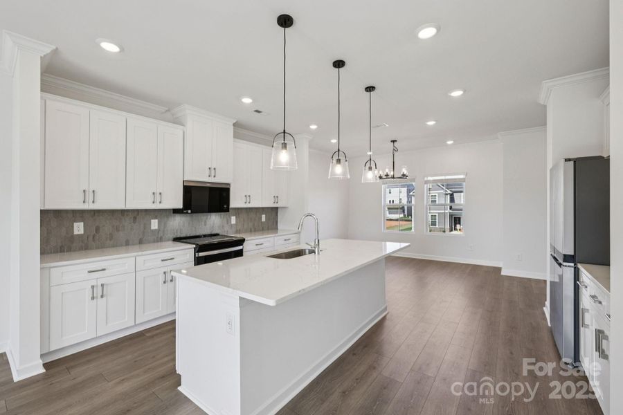 Photo is not of the actual home, but is an inspirational photo of builder’s model home and may depict options, furnishings, and/or decorator features that are not included