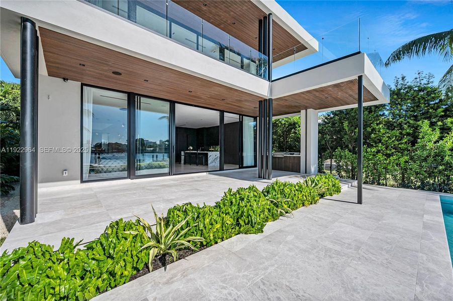 Exterior details and patio area of a home in , Miami Beach (Image 24).