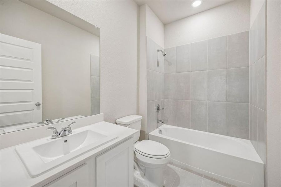 Bathroom in the Wimbledon home plan by Trophy Signature Homes – REPRESENTATIVE PHOTO