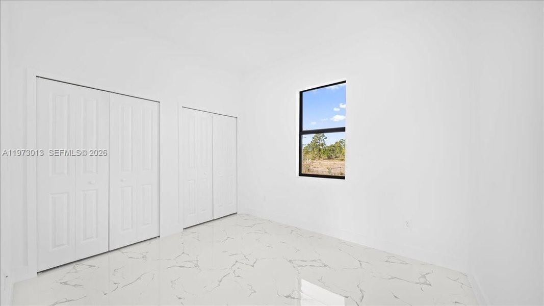 Spacious, unfurnished interior of a new home in , Lehigh Acres (Image 21).
