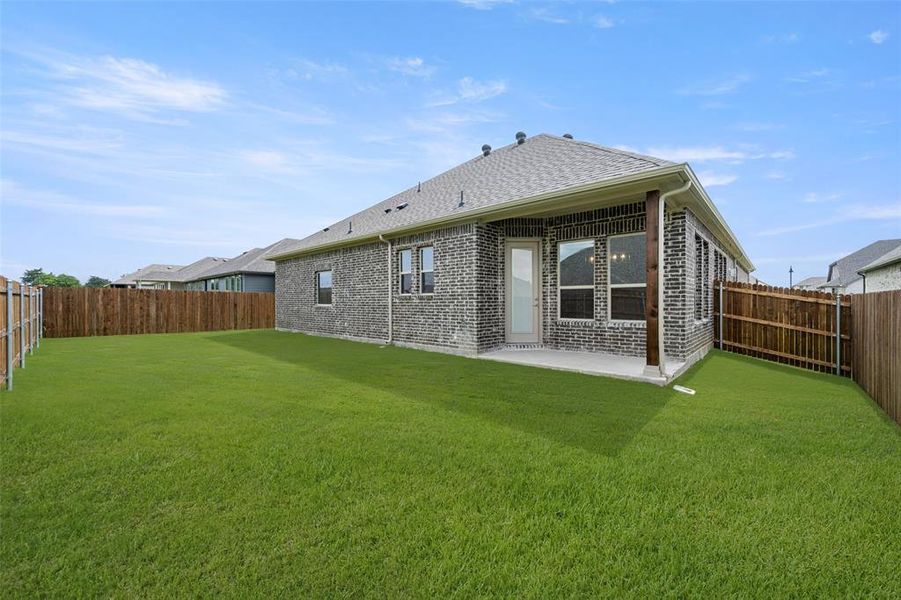 Front exterior of a new home in Sheppard's Place, Waxahachie, TX, highlighting curb appeal (Image 1). Front exterior of a new home in Sheppard's Place, Waxahachie, TX, highlighting curb appeal (Image 1).