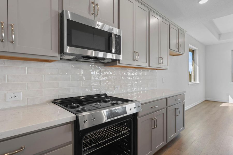 This kitchen is not only a functional space but also has ample storage. Whether you're a seasoned chef or just love to gather and enjoy good food, this kitchen is a dream come true. This kitchen is not only a functional space but also has ample storage. Whether you're a seasoned chef or just love to gather and enjoy good food, this kitchen is a dream come true.