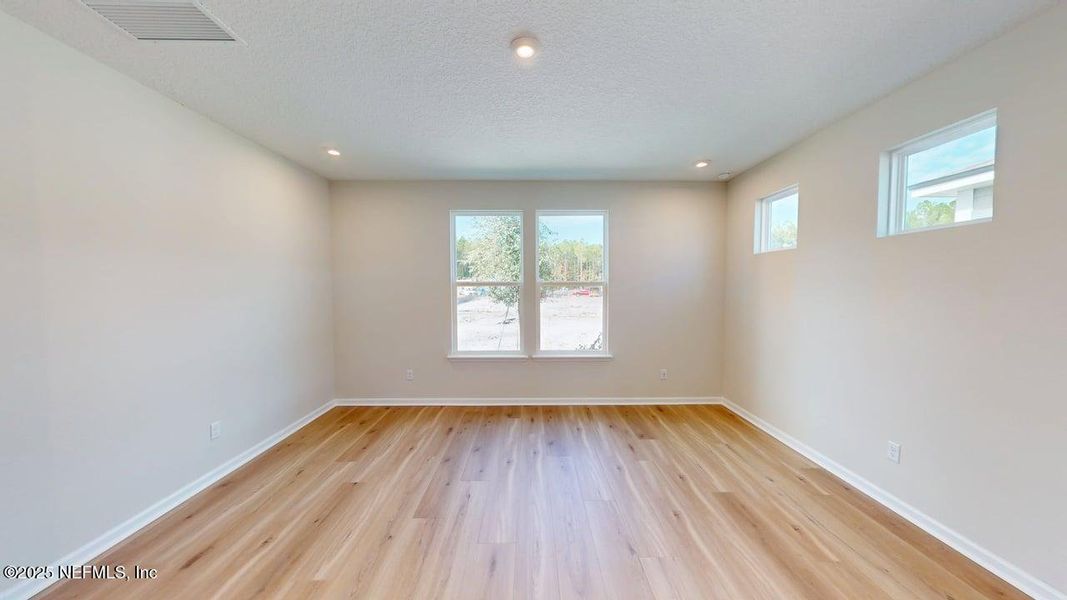 Spacious, unfurnished interior of a new home in RiverTown - WaterSong, St. Johns (Image 12).