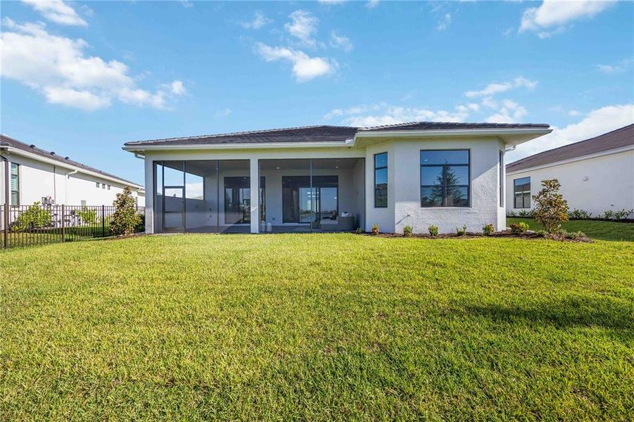 Front exterior of a new home in , Sarasota, FL, highlighting curb appeal (Image 24). Front exterior of a new home in , Sarasota, FL, highlighting curb appeal (Image 24).