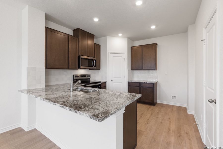Furnished interior view inside a new home in Knox Ridge, Converse (Image 10).