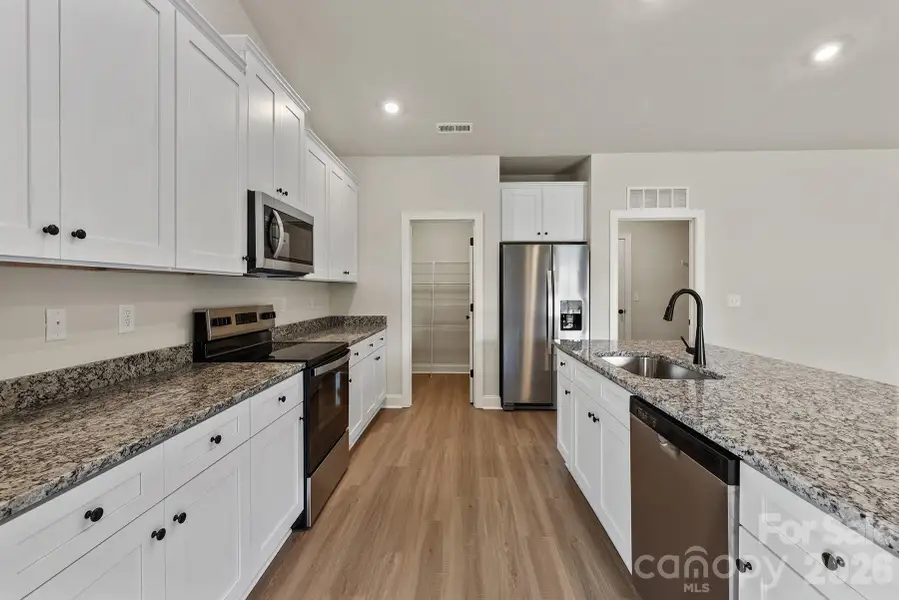 Furnished interior view inside a new home in Ascot Woods, Charlotte (Image 8). Furnished interior view inside a new home in Ascot Woods, Charlotte (Image 8).