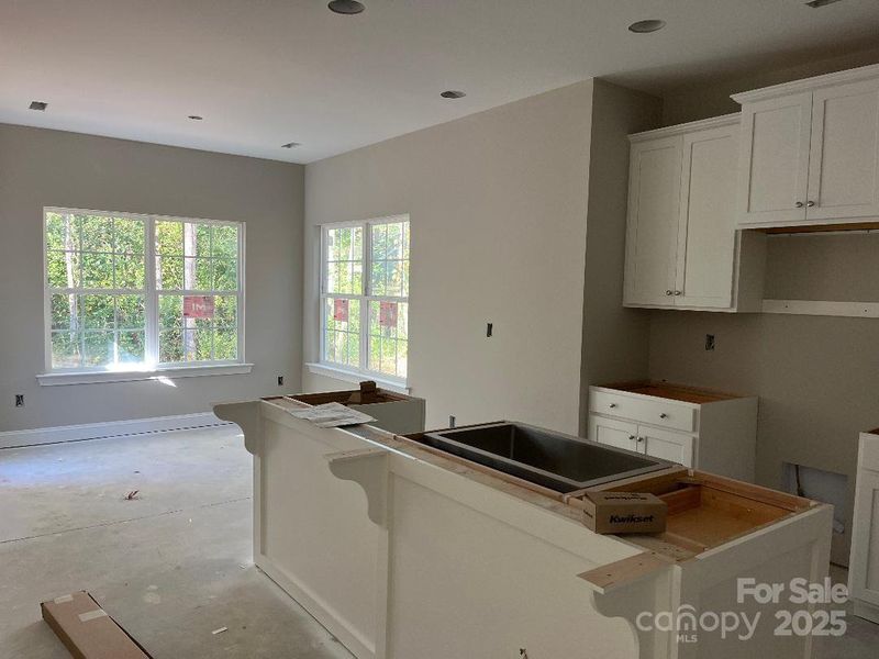 Furnished interior view inside a new home in , Huntersville (Image 3).