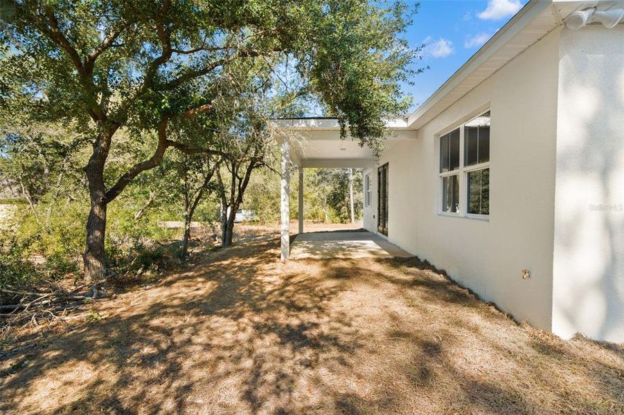 Exterior details and patio area of a home in , Citrus Springs (Image 33).