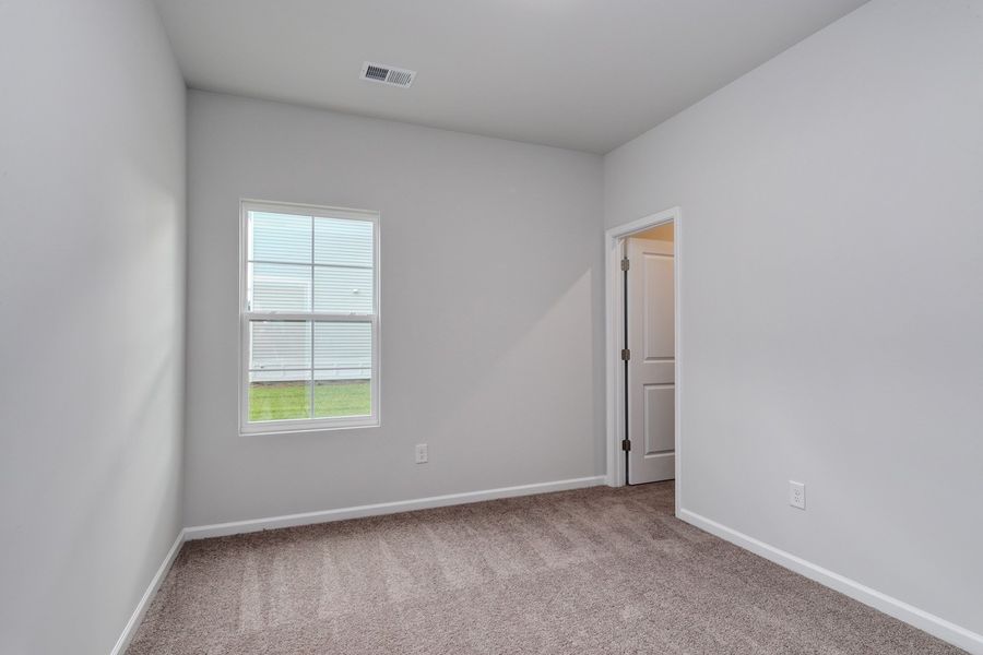 Spacious, unfurnished interior of a new home in Hainer Place, Conway (Image 26).