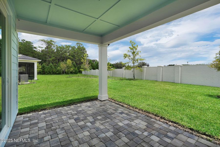 Exterior details and patio area of a home in Summer Bay at Grand Oaks, St. Augustine (Image 3). Exterior details and patio area of a home in Summer Bay at Grand Oaks, St. Augustine (Image 3).