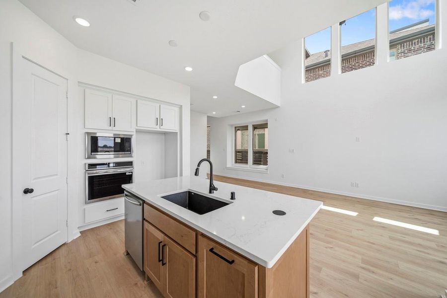 Furnished interior view inside a new home in Bridgeland, Cypress (Image 8).