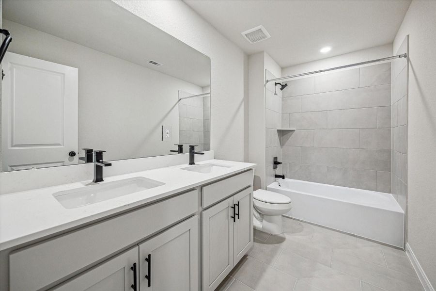 Furnished interior view inside a new home in Elyson, Katy (Image 10).