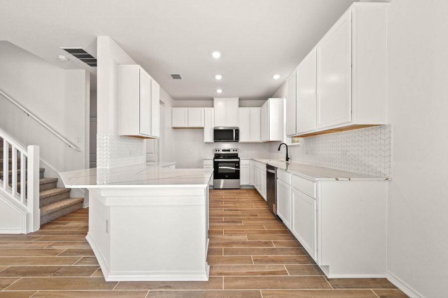 Furnished interior view inside a new home in Creekside at Estancia, Austin (Image 12).