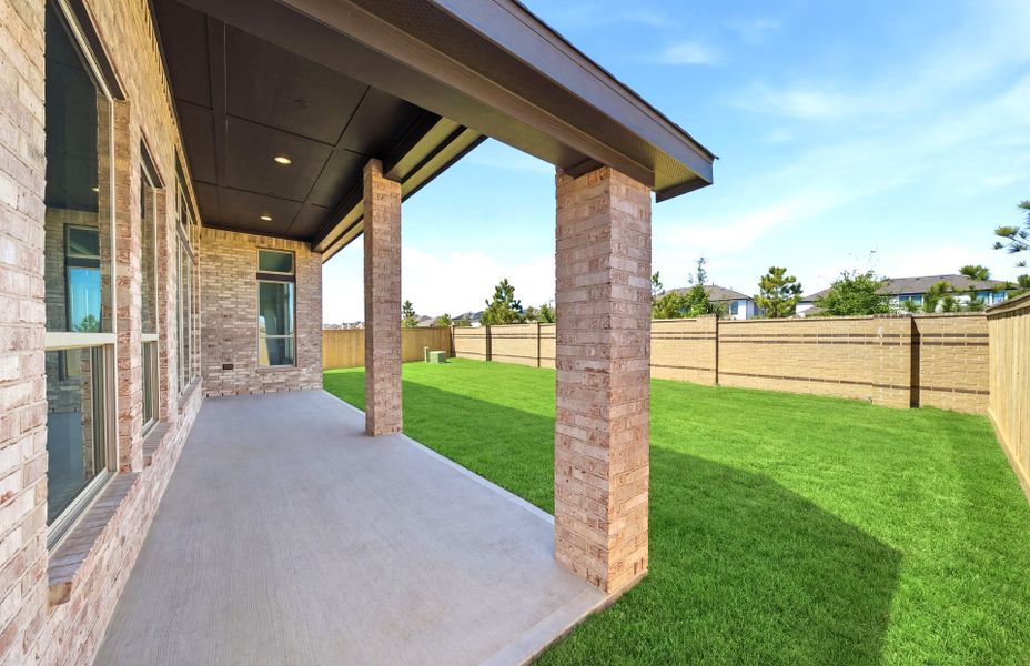 Exterior details and patio area of a home in Bridgeland 60′, Cypress (Image 26). Exterior details and patio area of a home in Bridgeland 60′, Cypress (Image 26).