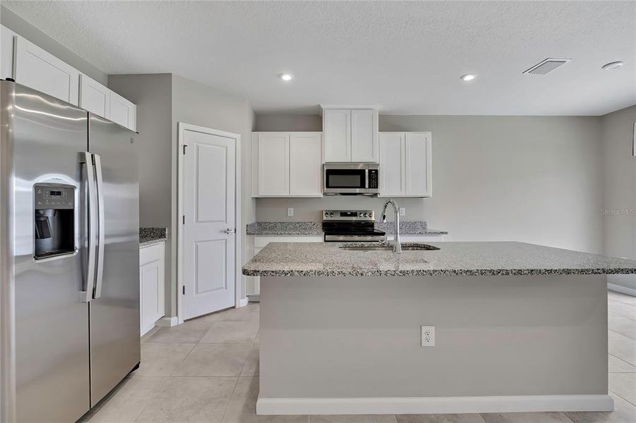 Furnished interior view inside a new home in , Sumterville (Image 11).