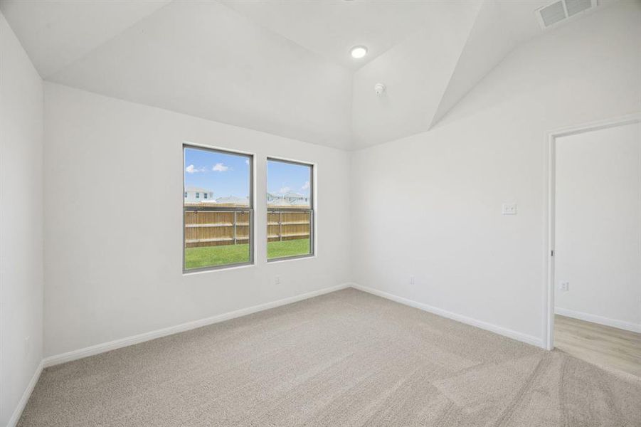 Primary Suite in the Cypress home plan by Trophy Signature Homes - REPRESENTATIVE PHOTO