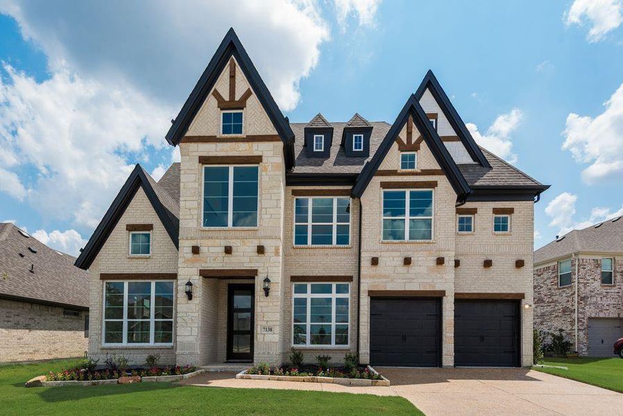 Front exterior of a new home in Prairie Ridge, Venus, TX, highlighting curb appeal (Image 2).