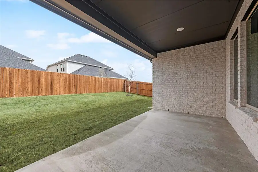 Exterior details and patio area of a home in Sutton Fields, Celina (Image 3).