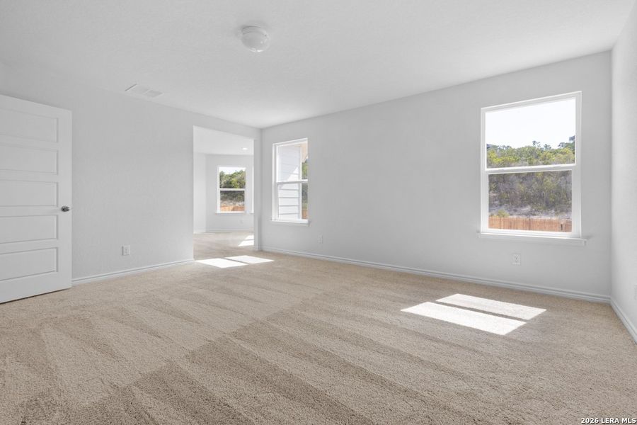 Spacious, unfurnished interior of a new home in Hidden Bluffs at TRP, San Antonio (Image 26).