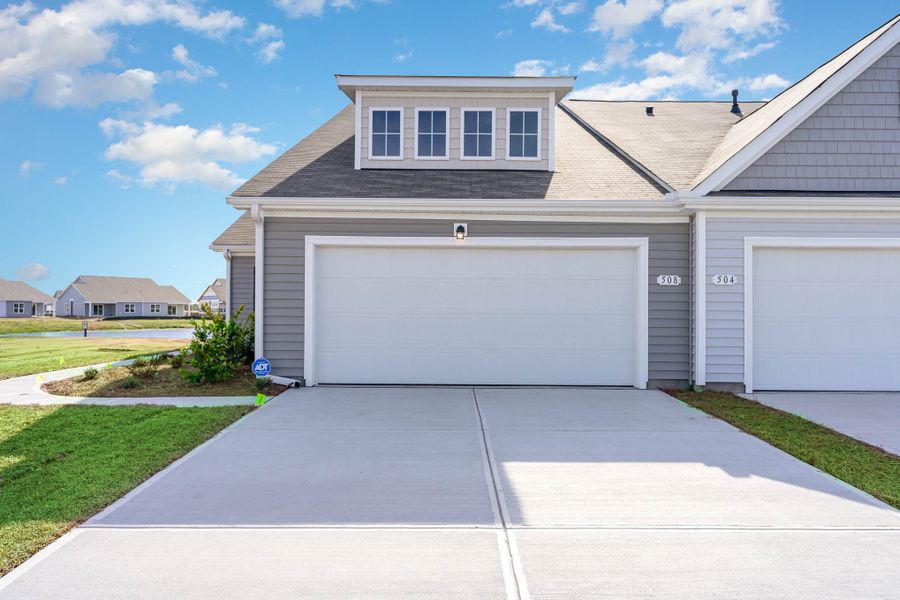 Representative exterior photo of a completed home built from the TUSCAN by D.R. Horton in Ridgefield, Conway, SC (Image 21). Representative exterior photo of a completed home built from the TUSCAN by D.R. Horton in Ridgefield, Conway, SC (Image 21).