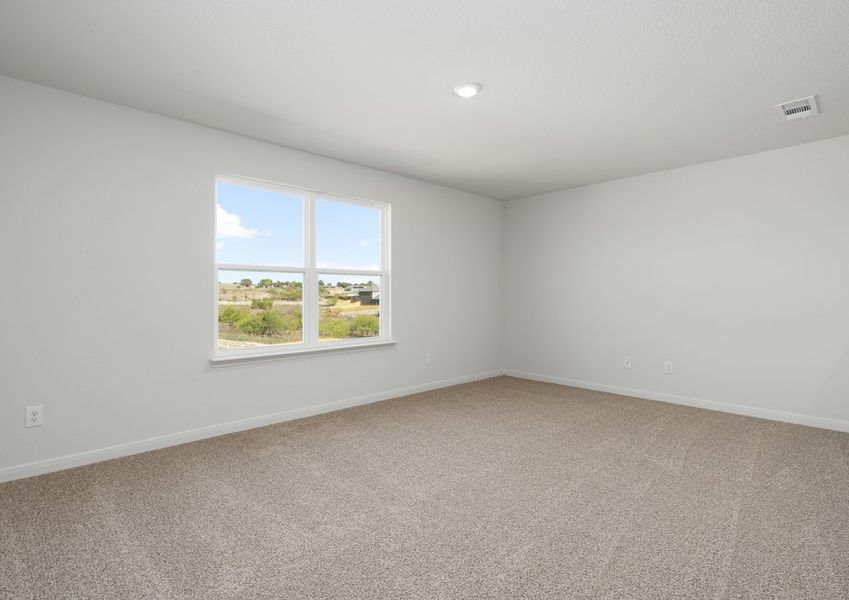 The upstairs loft is a versatile space for the family to utilize to fit their needs.